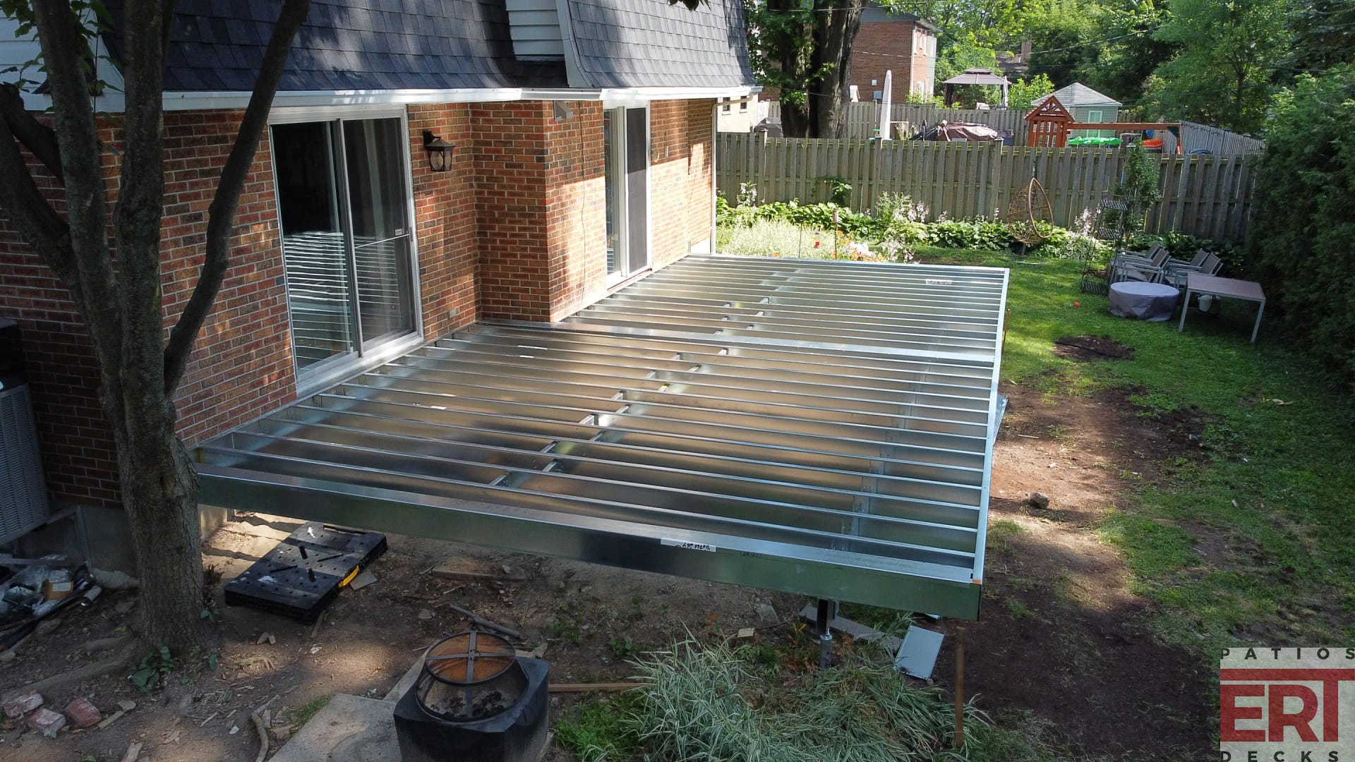 steel framed deck side view patio structure d'acier vue de coté montreal deck builder, west island deck builder, steel framed deck, PVC decking, Montreal deck installer, montreal composite deck builder, montreal trex deck, steel frame deck builder montreal, deck contractor montreal, installateur patio montreal, patio en structure d'acier montreal, patio en pvc montreal, patios en composite montreal, timbertech deck montreal, patios timbertech montreal, west island steel frame deck, west island pvc deck, west island composite deck, west island trex deck, west island timbertech deck, canadian made decking, landscape lighting montreal, eclairage paysage montreal, patio en structure d'acier, steel framed deck, bailey metal products truedeck, bailey truedeck, fortress evolution