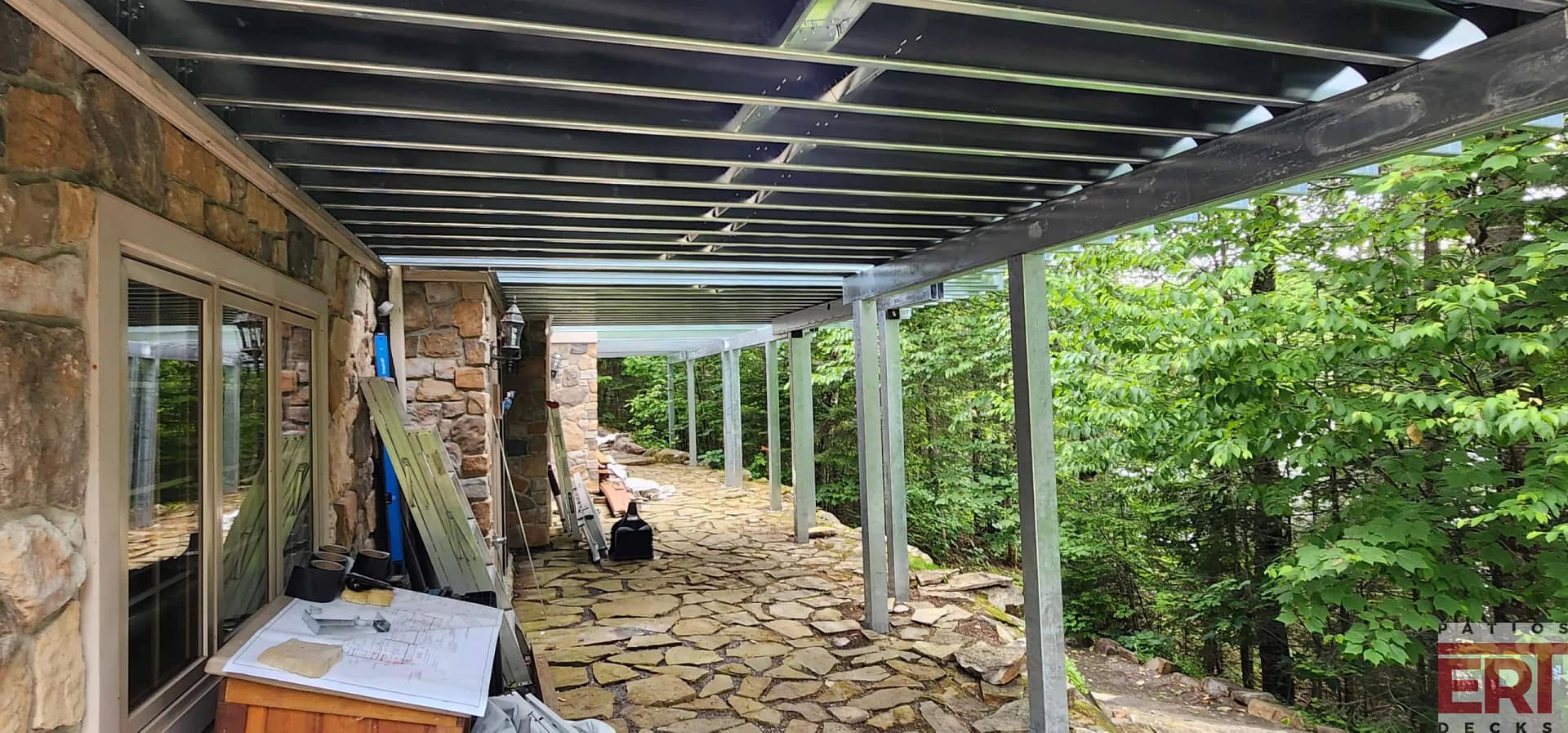 laurentien - underside view of the steel deck framing by Bailey Truedeck montreal deck builder, west island deck builder, Quebec deck builder, patio composite, patio montreal, patio Quebec, patio structure d’acier, patios structure d’acier, patios structure d’acier montreal, steel framed deck, PVC decking, Montreal deck installer, montreal composite deck builder, montreal trex deck, steel frame deck builder montreal, deck contractor montreal, installateur patio montreal, patio en pvc montreal, patios en composite montreal, timbertech deck montreal, patios timbertech montreal, west island steel frame deck, west island pvc deck, west island composite deck, west island trex deck, west island timbertech deck, canadian made decking, landscape lighting montreal, eclairage paysage montreal, patio en structure d'acier, steel framed deck, bailey metal products truedeck, bailey truedeck, fortress evolution, nadra, in-lite outdoor lighting, inlite outdoor lighting, frameless glass railing, lighted frameless glass railing, lighted aluminium railing, backyard, patio, deck,fence montreal, fences montreal, fences in montreal, fence in montreal,montreal decks, decks montreal, deck montreal, fence companies montreal, deck building montreal, composite decks montreal, fencing montreal, fencing montreal, cedar fence panels, wood pergolas, fences montreal, montreal west pool, fence montreal, natural light patio covers, pergolas covers, wood fences styles, cedar decks, patio deck montreal, patio deck montreal, outdoor deck company, wood deck company, pro deck installers, cedar wood fence, cedar wood fence panels, yard fencing companies, companies that put up fences, fence replacement companies, company fence, aluminum railings montreal, pvc fence montreal, dream deck and fence inc, can do fence & deck, island deck, wood fence replacement, fencing contractors wanted, find fence company, pool fence contractors, pergola montreal, west island contractors, outdoor patio structures, patio structures, outdoor covered patio structures, patio covered structures, wooden patio structures, backyard patio structures, covered arbors patios, turning pergola into covered porch, cedar fence designs, pool fences and gates, pool fence options, fences for pools, security pool fence, backyard pool fence, cool pool fences, glass pool safety fence, decks fences and more, wood deck companies, the deck and fence company, all around fence and deck, quick contractors montreal, cedar fence panels price, glass railings montreal, double picture frame deck, wooden patio covers, pool safety gates, patio structure, pool fence montreal, pool installation montreal, fence installers, cedar wood panels, fence around pool law Quebec, pool fences montreal, fences in montreal, deck builders montreal, composite deck contractors, cloture west island, deck montreal, montreal decks, patio cover wood, patio covers pergolas, patio covers wood, fence companies montreal, aluminum railing montreal, premium fence company, montreal deck builders, montreal deck builders, patio rampe expert, rampe patio horizontal, solarium montreal price, deck building montreal, pro fence and decks, pro fence and deck, west deck, cedar deck skirting, fence contractors montreal, fence in montreal, pool fencing montreal, installers group, safety fence pool, composite decks montreal, railings montreal, fences laval, companies in west island, creative fences, creative fence and decks, patio et terrasse 2000, best patios montreal, pvc deck ideas, composite deck veranda, metal spindles for deck railings, secure pool fence, pool fence Quebec, patio design montreal, patio deck covers, glass railing montreal, pool deck fence, fencing west island, steel deck frame, steel decking frame, steel deck, steel framed decks, steel decking beams, metal decks, metal decking joists, metal joists for decking, metal decking frame, metal deck, steel joist for decks, steel joist deck, steel decking joists, deck framing, decking frame, steel framing, steel frame, decking stairs calculator, deck builders, framing, building a deck frame, patio builders, wood deck builders, decking frame wood, deck and patio builders, deck building contractors, wood deck contractors, residential decks, frame outdoor deck, deck contractor, deck builders in my area, deck builders near me, deck and patio contractors, deck contractors near me, deck installers near me, deck companies near me, deck building companies near me, metal decking contractors, deck and patio contractors near me, patio and deck builders near me, who builds decks near me, deck construction near me, steel decking contractors, pergola builders, gazebo builders near me, decks for small homes, decking images patio, patio decks pics, pictures of pergolas with roofs, elevated deck pergola, deck company, deck and fence contractors, decking companies near me, deck installation near me, deck contractors in my area, deck builder near me, patio and deck contractors near me, fence and deck companies near me, decks companies near me, steel building contractors near me, metal builder near me, deck products, deck steel, decking system, patio companies near me, patio builder near me, deck building contractors near me, metal decking, pergola on a raised deck, raised deck pergola, raised deck with pergola, building a pergola on a raised deck, steal steel, round pool deck framing, deck builders kit, deck company near me, floating stairs with glass railing, deck contractor near me, metal deck posts, wooden pergola kits Canada, decking base, decking kits with pergola, metal studs gauge chart, exterior steel stairs, deck stair lighting ideas, patio construction near me, metal decking posts, steel decking posts, pictures of decks with pergolas, aluminum deck framing, metal posts for decks, deck stairs lighting ideas, joists for decking, metal railings near me, aluminum pergola kits Canada, deck supplies near me, steel deck posts, metal posts for deck, metal support posts for deck, joist span chart deck, raised deck privacy ideas, deck beam sizing calculator, floating deck with pergola,pergola on raised deck, pergola on floating deck, metal pergola Canada, staircase components names, patio and deck pictures, metal deck frame, fortress steel deck framing, fortress steel, trex deck builder, trex deck designer, trex steel deck framing, deck on steel, deck on steel framing system, deck railing framing, deck railings metal, deck steel railing, exterior steel stair, fortress deck, fortress evolution, fortress framing, fortress glass railing, metal deck joists, metal deck stair railing, metal deck support posts, metal deck supports, metal decking posts, regalideas railing, regalideas crystal rail, crystal rail, rampe aluminium regalideas, rampe aluminium, regalideas,